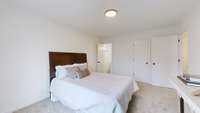 MASTER BEDROOM WITH WALK IN CLOSET.