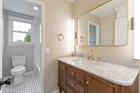 Full bath on other side of house by the additional 3 bedrooms