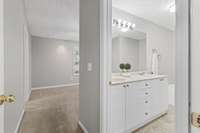 This is the Master Bath. It is to the right, before you enter the Master Bedroom.  There is a door that can be closed in the hallway for privacy with this bath and bedroom.