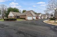 This location is also right across from the mailboxes. Most residence will place table and/or chairs in garage and open it up and mingle with neighbors, while they are walking, or going to get their mail. :)