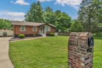 This street view picture shows how conveniently located the homes separate in law quarters in located to the main home. Apartment features double doors for handicap access if needed also perfect for moving in new furniture or equipment.