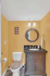 Perfect half bath located in this homes walk out basement.