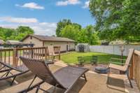 View from first floor deck upon back yard and fire pit.