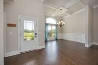 Entry and formal dining room with open floor plan