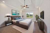 This photo of the primary suite has been virtually staged