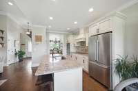 Pantry is to the left of the oven.