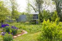 This playhouse is such a lovely place to take in the entire property.