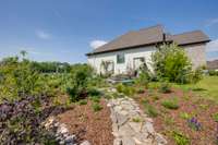 In this American version, plants have been used that are better suited to the heat and humidity of Tennessee. It is primarily planted with perennials w/ a focus on flowers that are either beautiful, long producers of flowers, or supports pollinators.