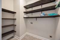 Laundry room - located beside the garage and on the bottom level of home.