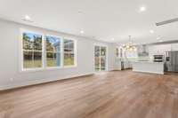 Great room, casual dining area, and kitchen *Photos are for representational purposes only and are of a similar floor plan with differing finishes*