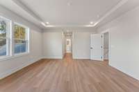 Primary bedroom *Photos are for representational purposes only and are of a similar floor plan with differing finishes*