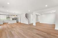 Great room, casual dining area, and kitchen to the left and dining room to the right. *Photos are for representational purposes only and are of a similar floor plan with differing finishes*