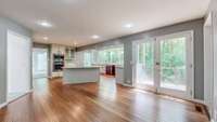 This space just keeps getting better with double-door access to the deck just outside the den.