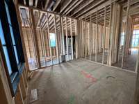 Laundry Room off of Garage and Mudroom * this home is under construction. Photo taken 6/17/25
