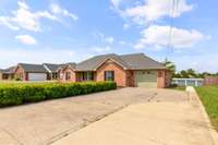Enjoy an extended driveway for parking,RV or any other need you may have.