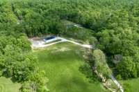 Off the grid- You have well water - spring water -and solar electric. Fiber optic internet is on the property.