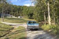 The mile drive down your private road leading from Drury Lane for the most complete privacy a location can offer..