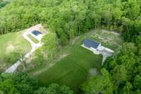 Areal of the newly renovated home; Guest home & barn. "Potential build sites" - there are 5 of them-behind the house/barn on top of the hill with fantastic views/unique locations.