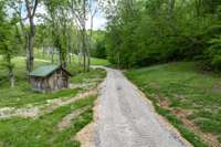 The driveway towards the house is completely private and hidden away from the road.