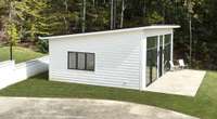 Guest house / office / workout room with a full bath and Murphy bed.