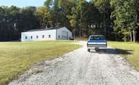 A 40X70X14 feet high (2,800 sq ft) brand new fully insulated metal storage building perfect for your classic car collection / workshop / studio or party barn!