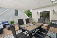 Just imagine the weekend brunches, bbqs, and evening meals you will enjoy on this large sun shade covered deck that is right off both the kitchen and the living room!