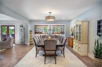 The large, open dining room can comfortably seat 8+ people.
