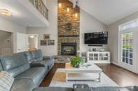 All stone gas fireplace in your cozy living room space