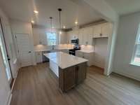 Designer Kitchen overlooking Pond Views! (6/07/25)