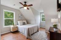 This room has a queen size bed and lots of space with beautiful window views and natural light.