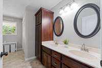 Double oversized vanity with lots of cabinet storage.