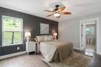Primary bedroom located on the main floor with an ensuite bathroom.