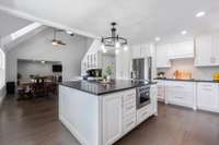 Kitchen opens to the large over sized dining space with a butlers pantry / wine or coffee bar.