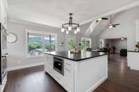 Look at the views into the dining space with a beautiful vaulted ceiling.