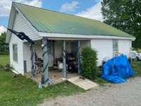 Covered front porch for relaxing and convenient entry/exit into the home.