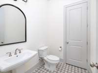 Bathroom just off of the den