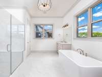 Primary bath with dual vanities and large shower