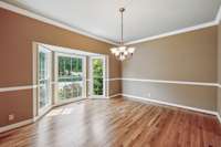 The huge formal dining space features beautiful wood floors, elegant trim, and a massive bay window that fills the room with natural light. 2403 Franklin Ln  Murfreesboro, TN 37130
