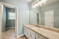 A large single vanity in the primary bathroom provides ample drawer and cabinet storage, making organization easy. It also features a stand-alone shower and jacuzzi tub. 2403 Franklin Ln  Murfreesboro, TN 37130