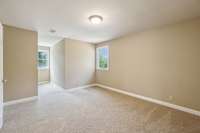 Bedroom 3 features two windows, neutral paint, and carpet flooring! 2403 Franklin Ln  Murfreesboro, TN 37130