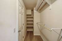 Walk-in closet in the primary suite with built-in shelving and clothing racks! 2403 Franklin Ln  Murfreesboro, TN 37130
