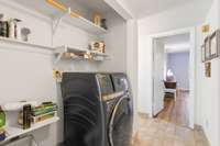 The utility closet is nice size and the all in one washer/dryer remains with the unit