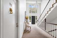 Walk into the foyer of the building! This unit is on the first floor on the right.