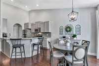 Looking from the breakfast nook to the kitchen. Such a smart layout.