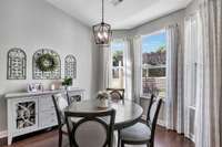The breakfast nook is the perfect size for an oversized four-person table.