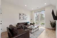 Large bonus room with floor to ceiling windows