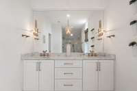 Double vanities in primary bedroom suite