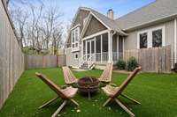 Private backyard with turf cover