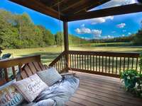 Relax on the covered front deck every morning or in the evening listening to nature.