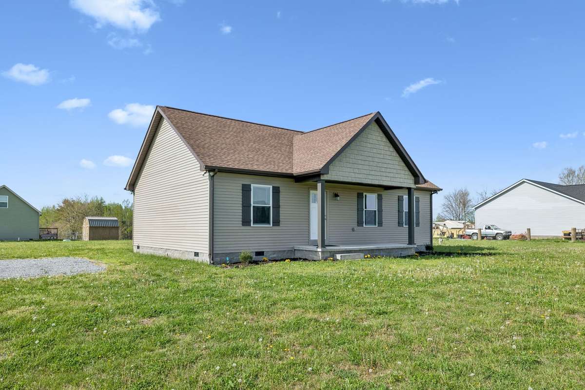 Charming like-new home situated on a beautiful 1.01-acre corner lot with inviting curb appeal and plenty of outdoor space.